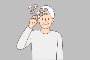 What Is Amnesia? Signs, Types, And Can It Be Prevented? 6 Illustration of an elderly man with puzzle piece sections out of place in his head.