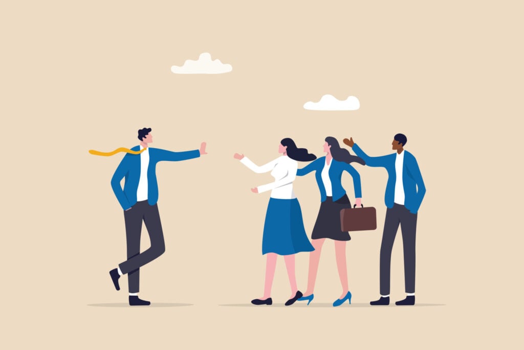 Learn Assertive Communication in 5 Simple Steps 1 a leader placing his hand up in front of their colleagues, being assertive