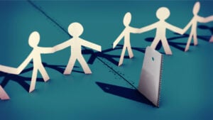 Group Polarization in Psychology: Definition & Examples 27 a chain of paper figures broken apart by a saw driving through them to represent group polarization