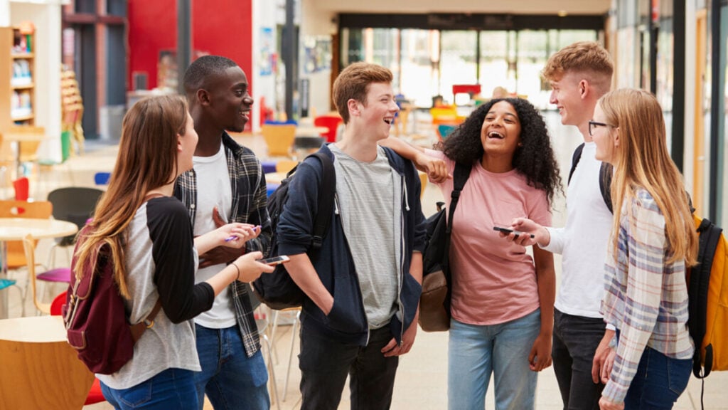 Socialization Examples in Sociology 1 Peer socialization is the process by which individuals learn and adopt behaviors, attitudes, and values through interactions with their peers, who are people of the same age or social group. Peer socialization can occur in a variety of settings, such as schools, clubs, sports teams, and online communities.During peer socialization, individuals may be influenced by their peers in many ways. For example, they may learn new skills, such as how to play a game or use technology, or adopt new attitudes and values, such as beliefs about politics, religion, or social issues. Peer socialization can also influence behavior, such as how to dress, speak, or interact with others.Peer socialization can have both positive and negative effects on individuals. On the positive side, peer socialization can provide a supportive network of friends, help individuals develop social skills, and promote positive behaviors, such as healthy eating and exercise habits. On the negative side, peer socialization can lead to negative behaviors, such as drug use, bullying, or risky sexual behavior, and can contribute to peer pressure and conformity.