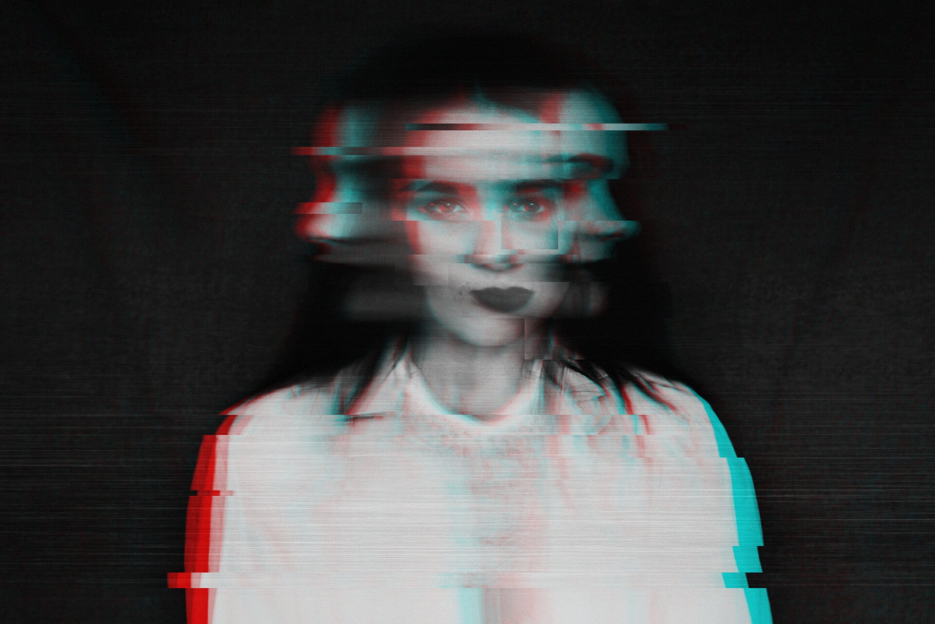 black and white blurred abstract portrait of a girl with a glitch effect