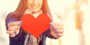 Dating with Intention 15 Red heart in the woman hands