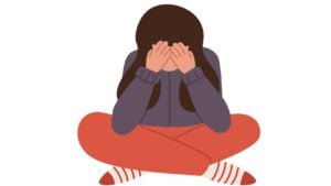 Denial as a Defense Mechanism 13 An adolescent girl sat cross-legged on the floor with head in her hands and feeling stressed.